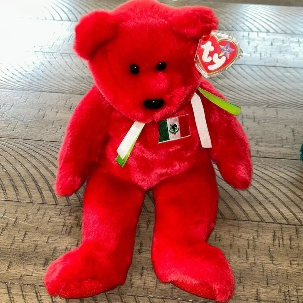 Osito Large Sized Beanie Baby 1999. Cute 🥰 cuddly and collectible. Tag cover